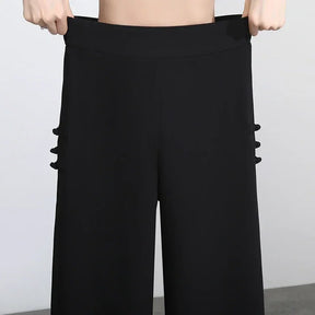 Calça Diva Natural™ Pantalona com Sobreposição Fluida