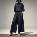 Conjunto Sofia™ com com Blusa Cropped Soltinha e Calça Saia de Cintura Alta